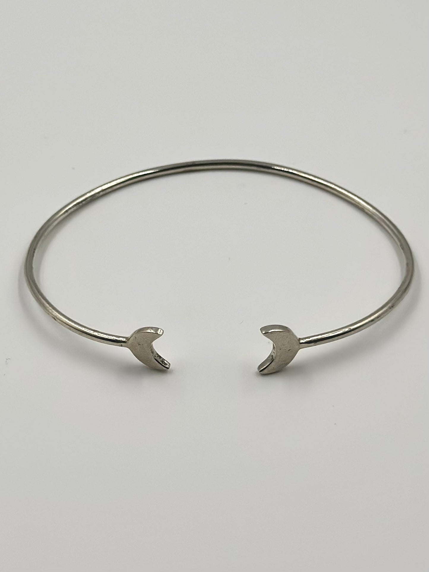 Half moon shaped sterling silver cuff bracelet