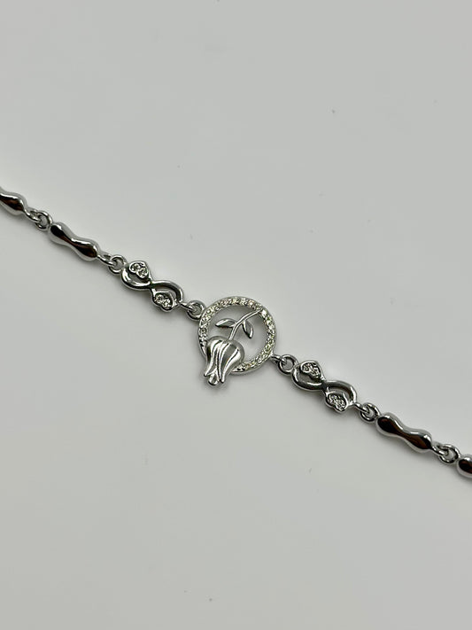 Zircon studded, rose design sterling silver link bracelet