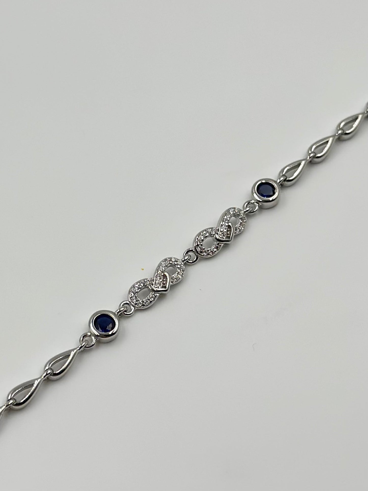Zircon studded sterling silver link bracelet