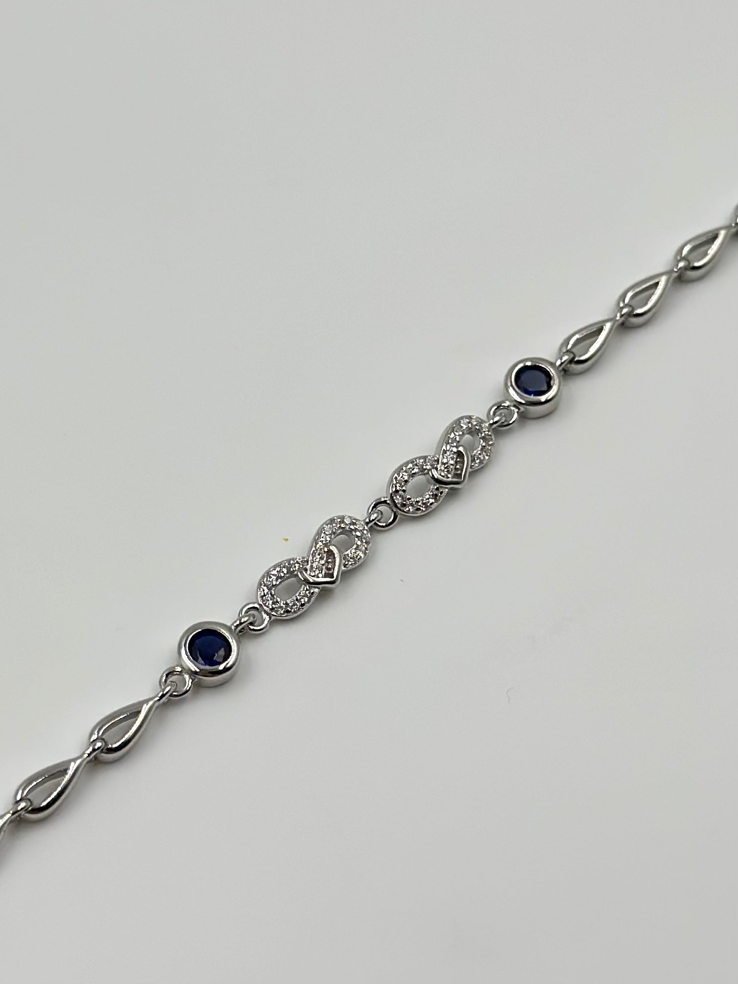 Zircon studded sterling silver link bracelet