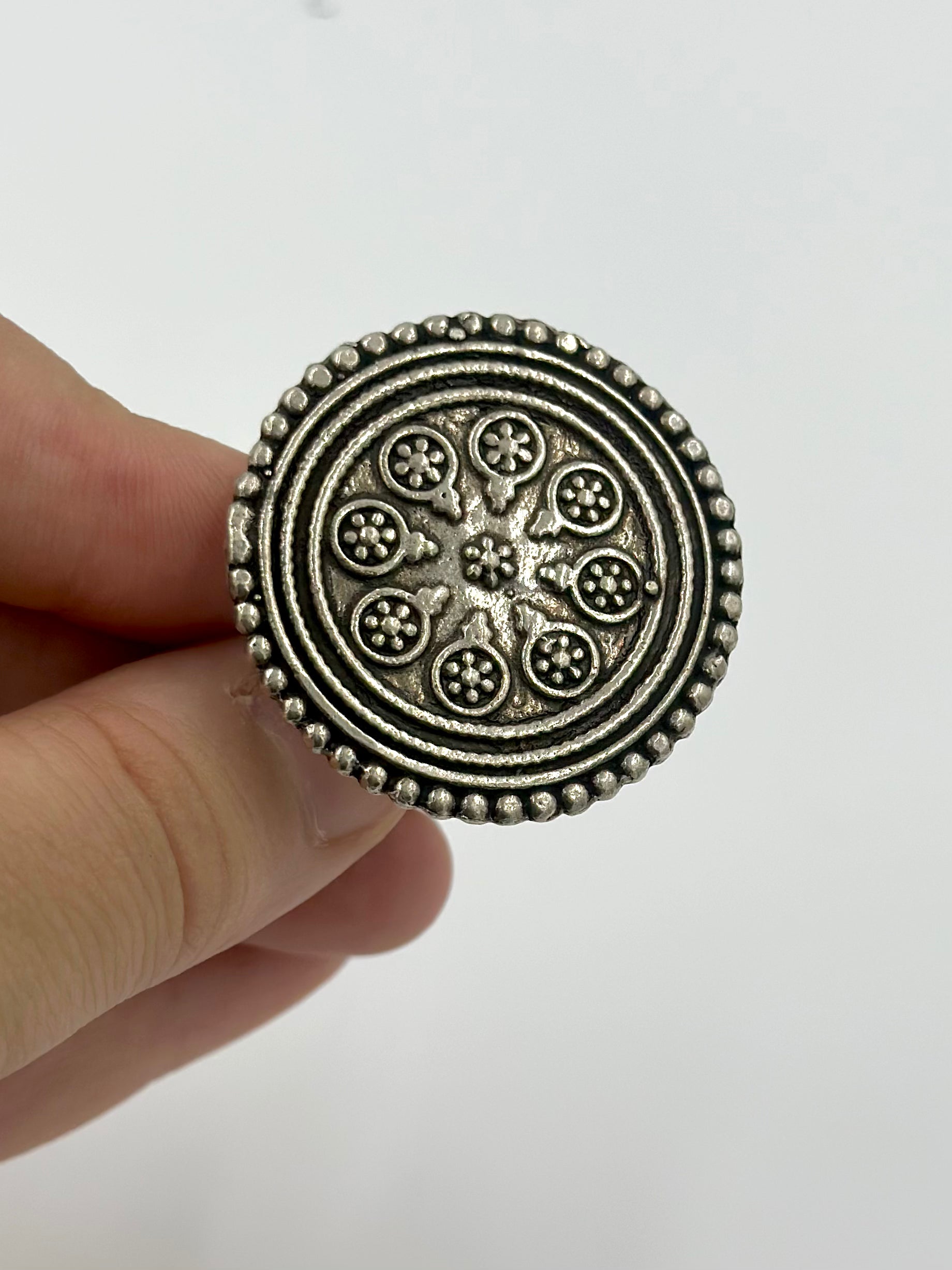 Oxidised, round shaped with fine detailing sterling silver cocktail ring