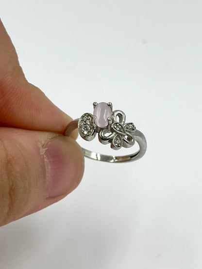 Zircon studded with a pink stone, flower shaped sterling silver artisanal ring