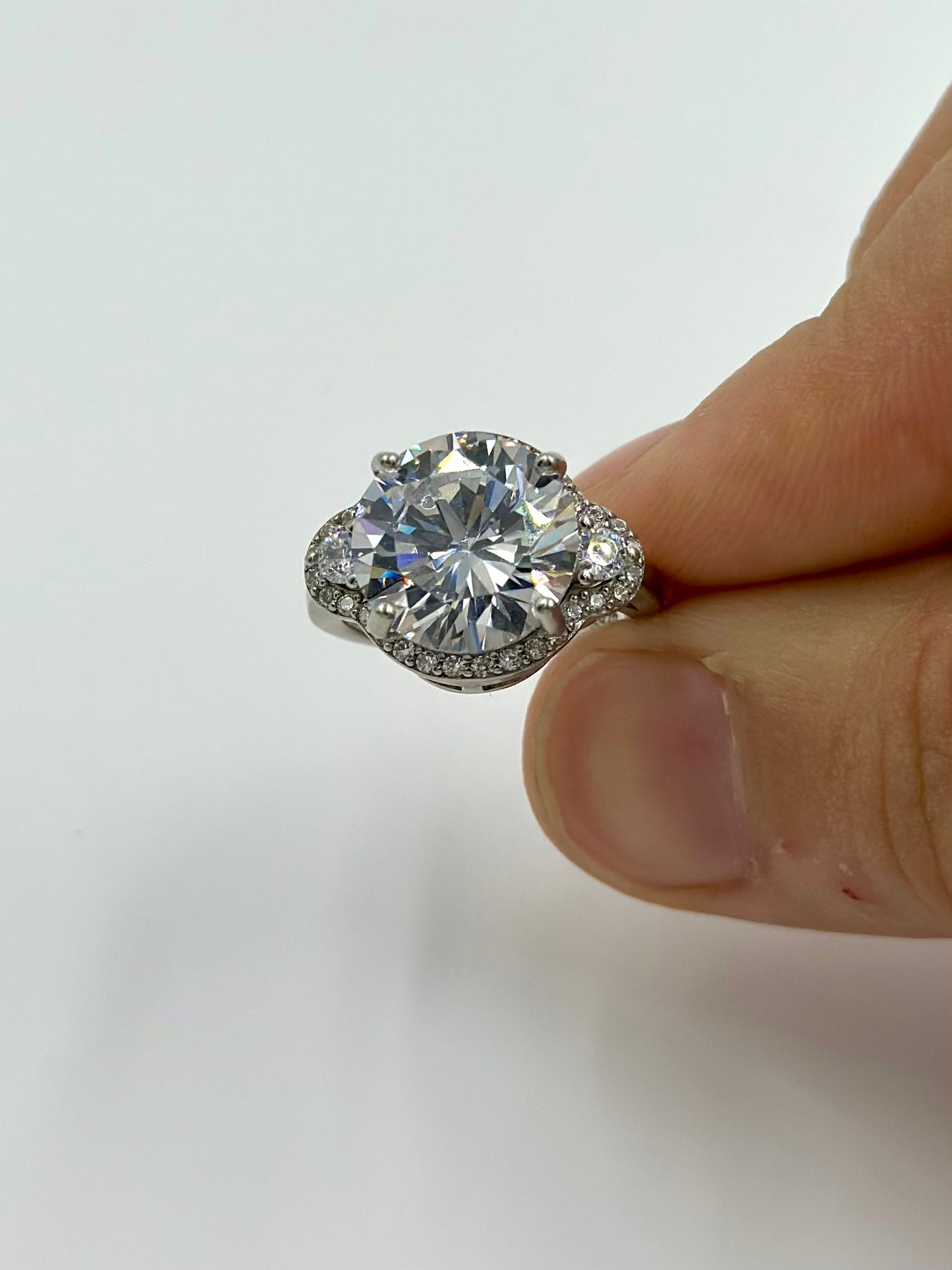 Zircon and stone studded, round shaped sterling silver cocktail ring