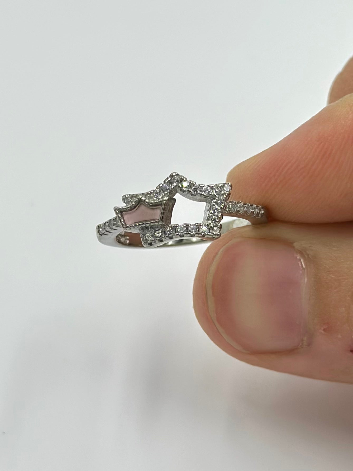 Zircon studded, double crown shaped sterling silver artisanal ring