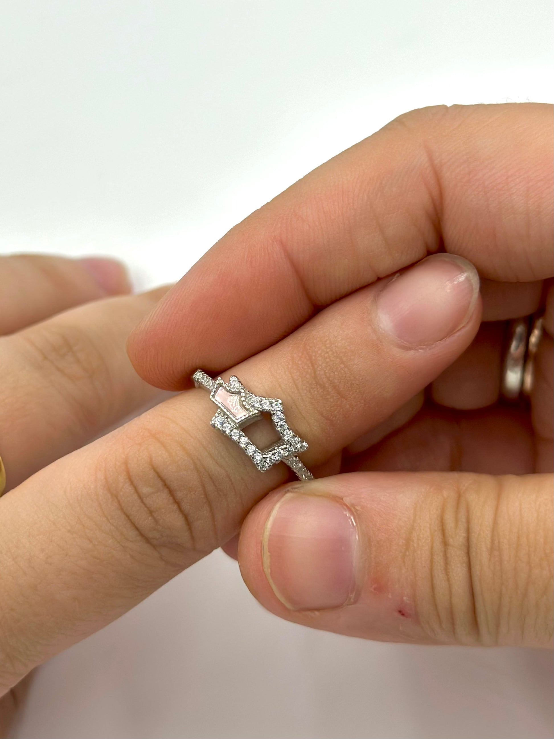 Zircon studded, double crown shaped sterling silver artisanal ring