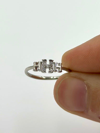 Zircon studded, H shaped sterling silver artisanal ring