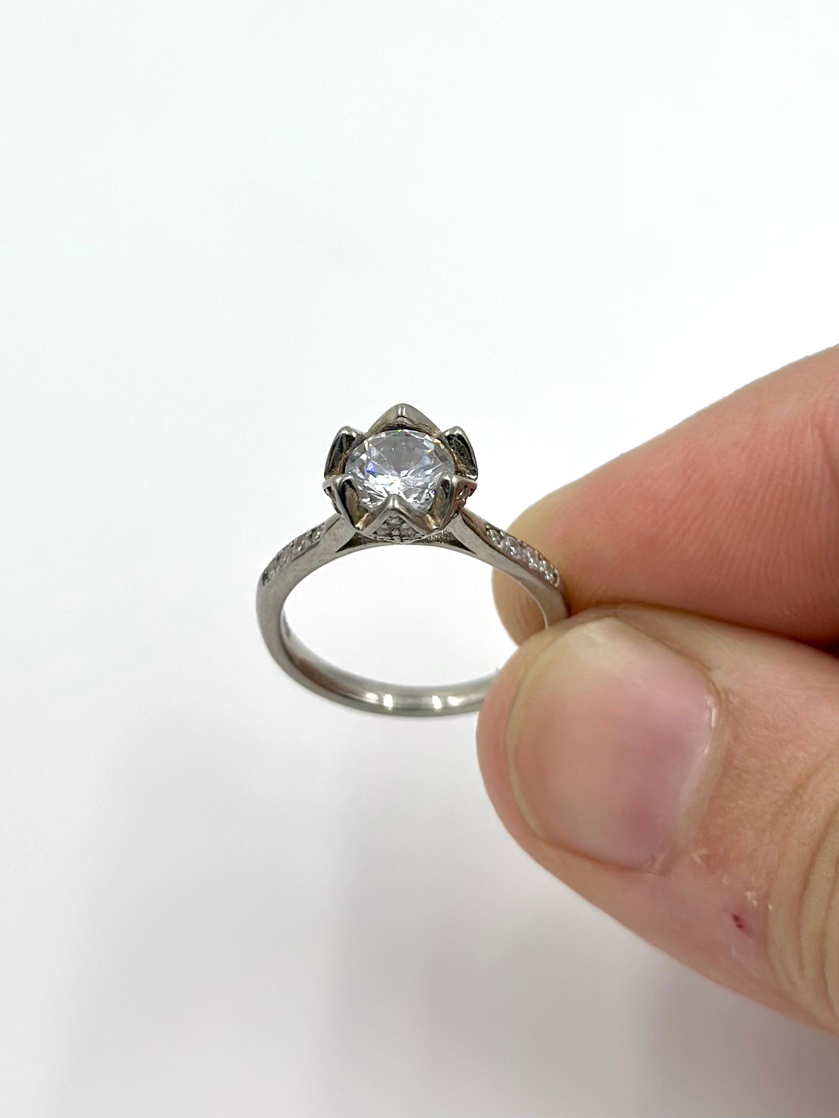 Zircon and stone studded, flower shaped sterling silver cocktail ring