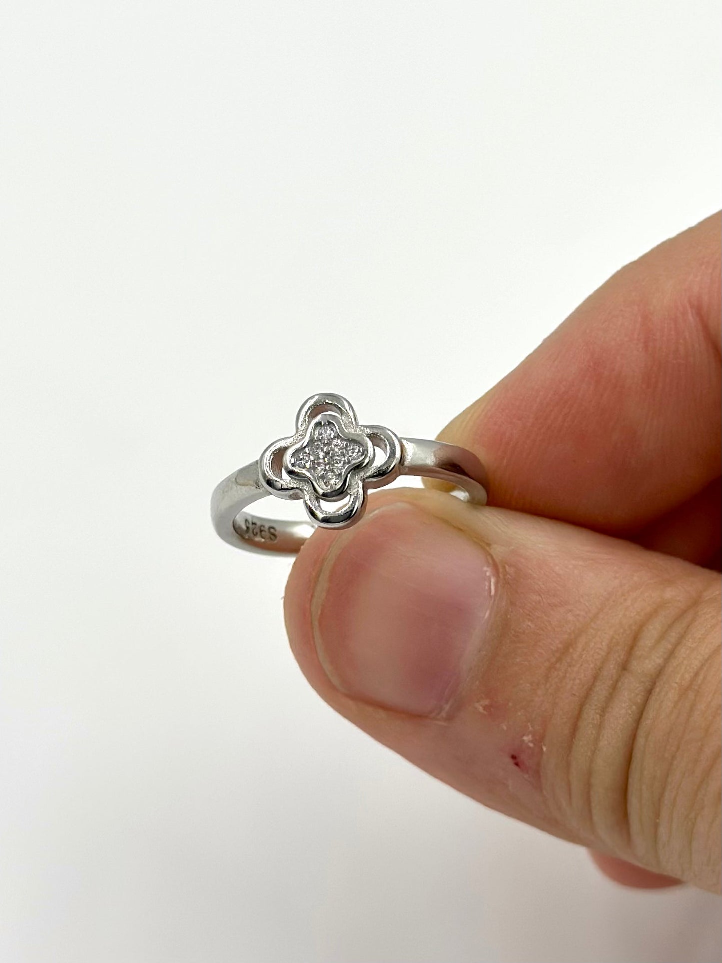 Zircon studded, flower shaped sterling silver artisanal ring