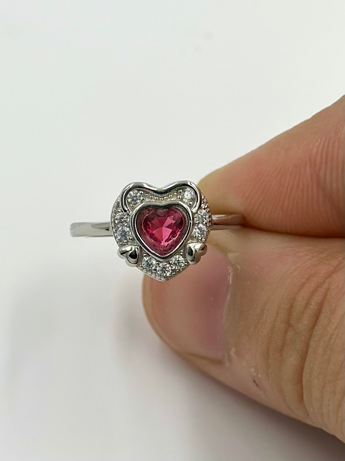 Ruby and zircon studded, heart shaped sterling silver artisanal ring