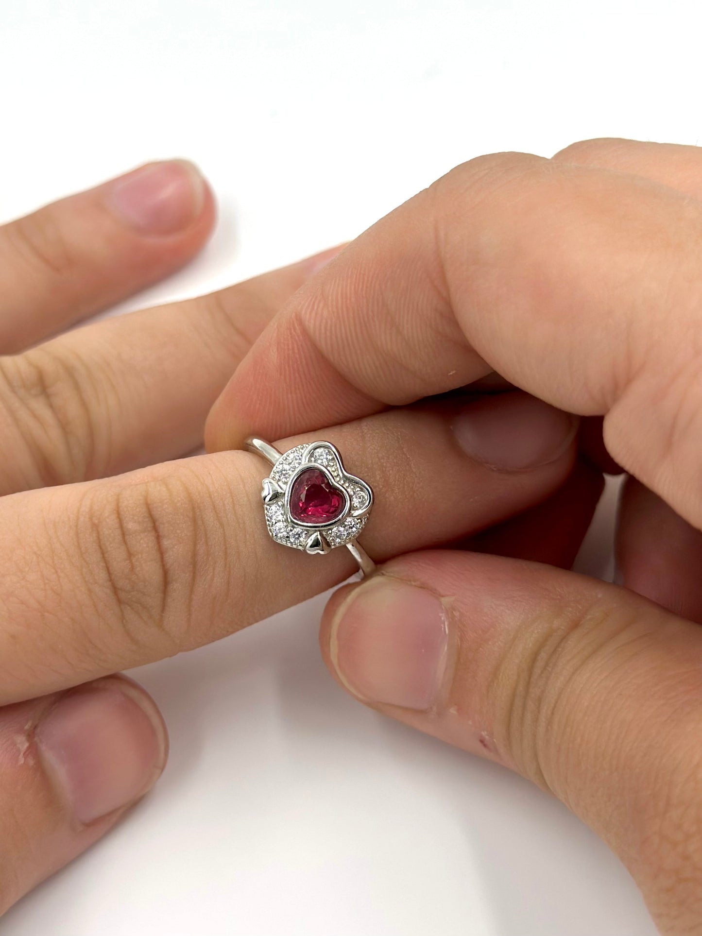 Ruby and zircon studded, heart shaped sterling silver artisanal ring