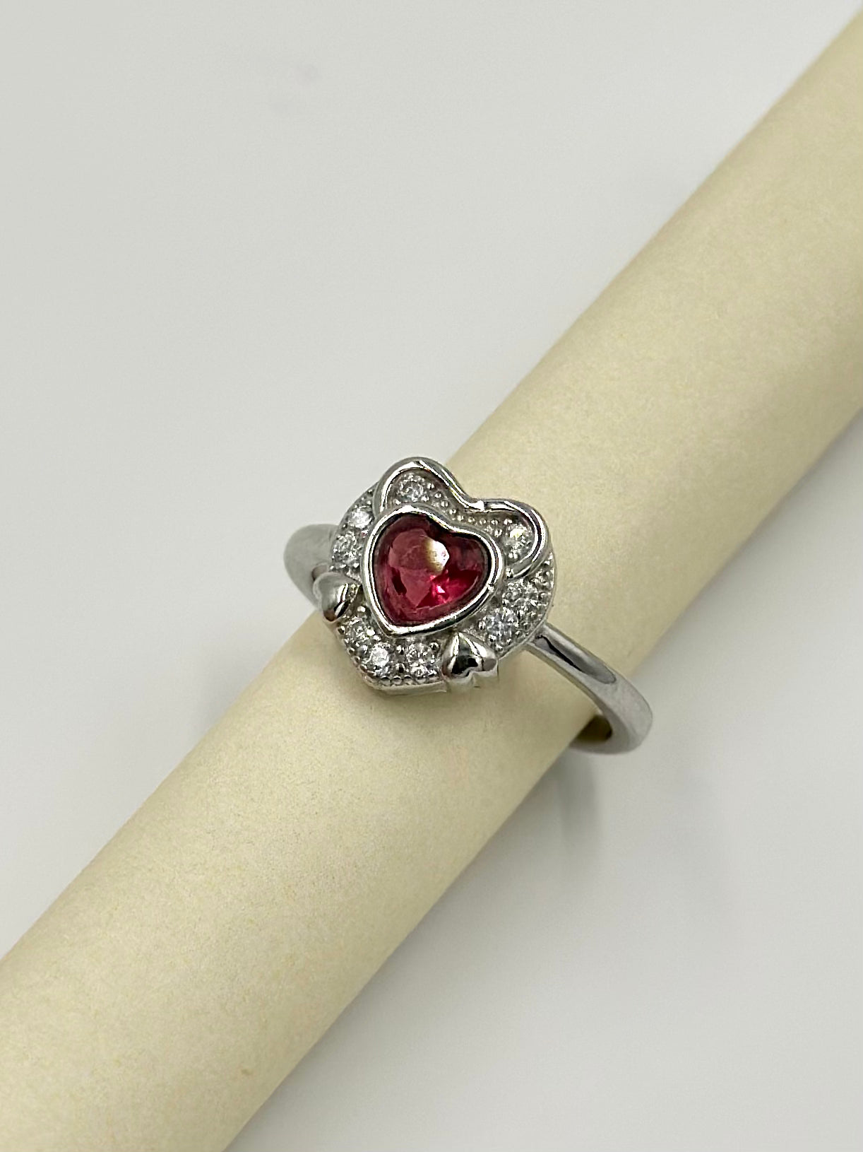 Ruby and zircon studded, heart shaped sterling silver artisanal ring