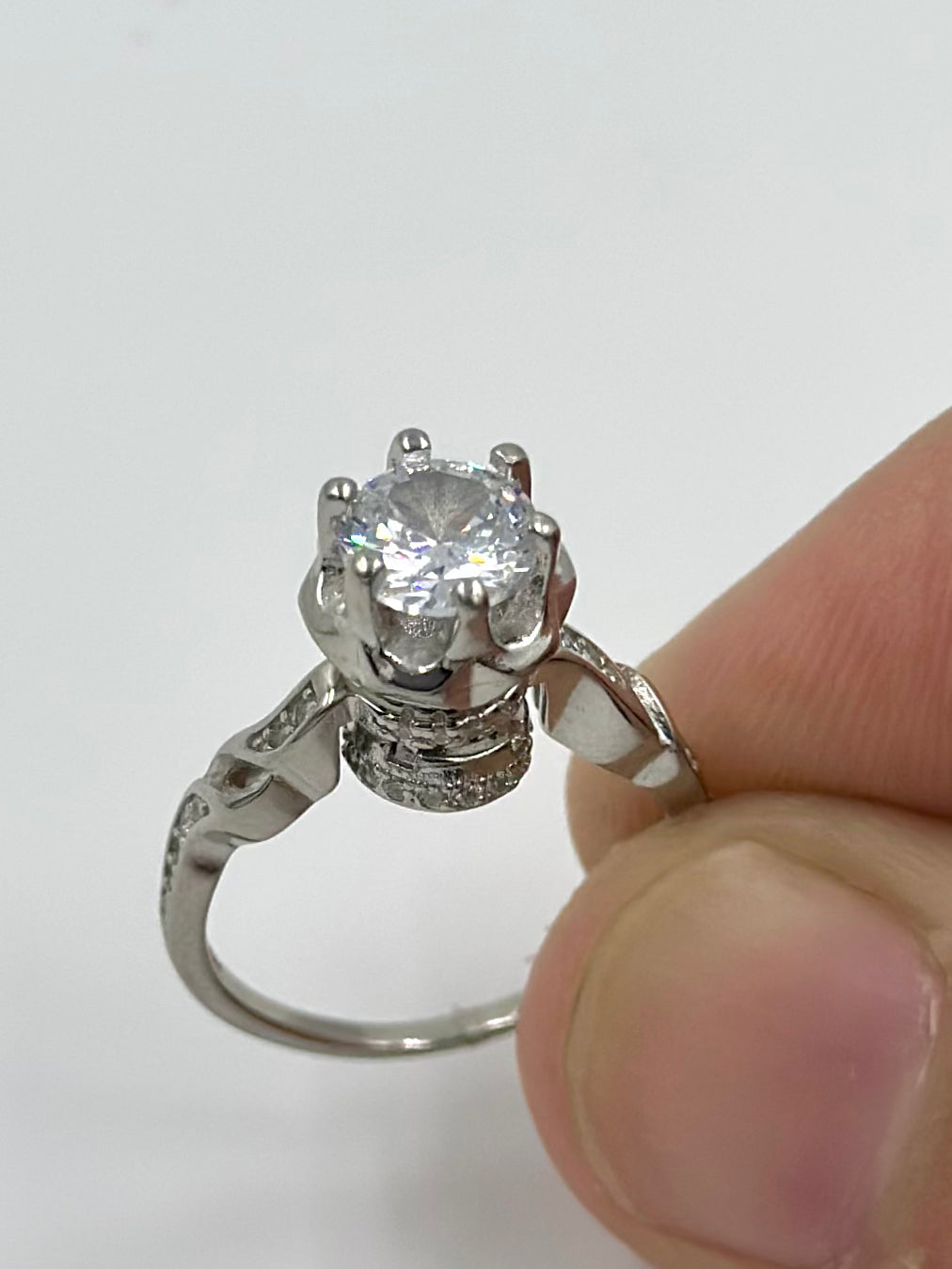 Zircon studded, flower shaped with spinner sterling silver cocktail ring