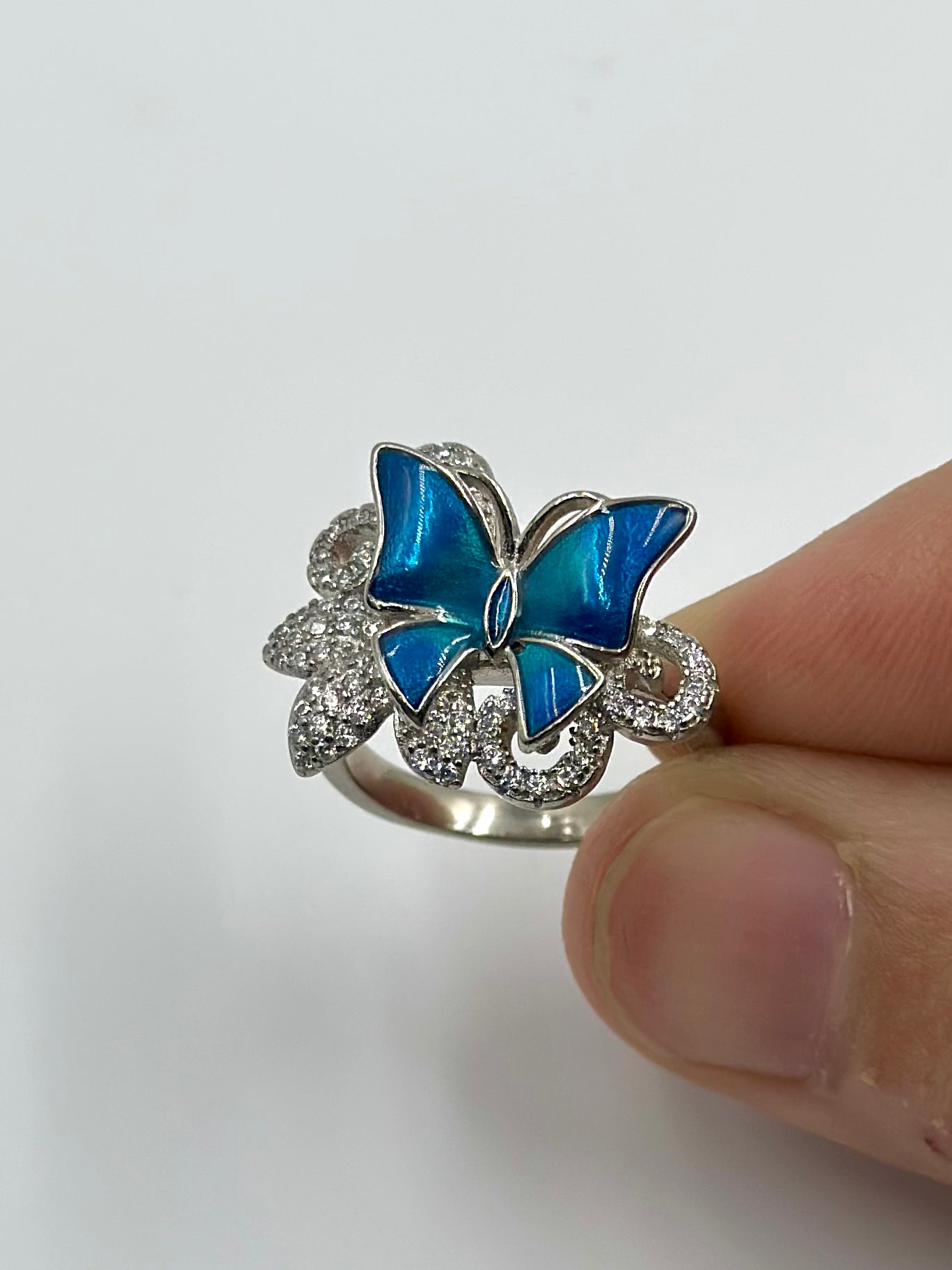 Zircon studded, enamel coated, butterfly shaped sterling silver cocktail ring