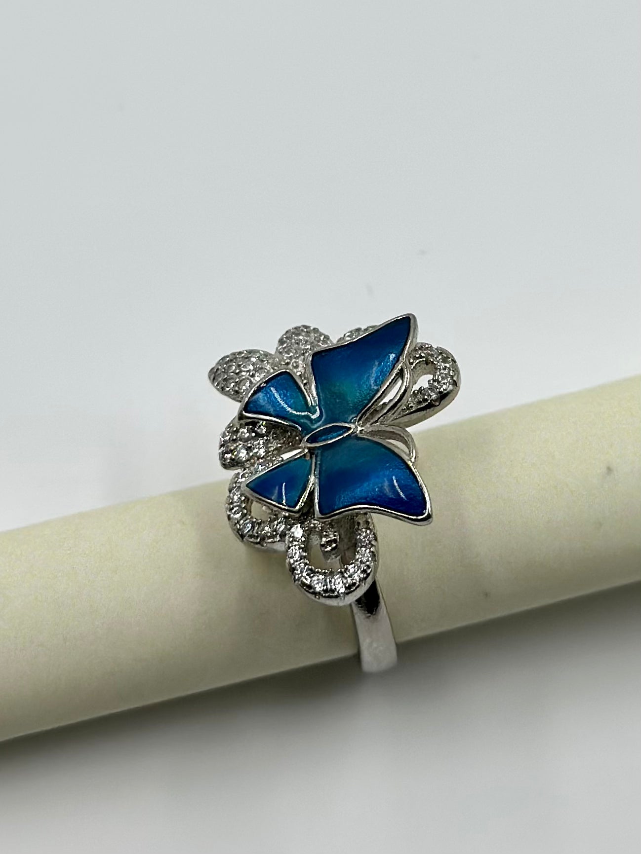 Zircon studded, enamel coated, butterfly shaped sterling silver cocktail ring