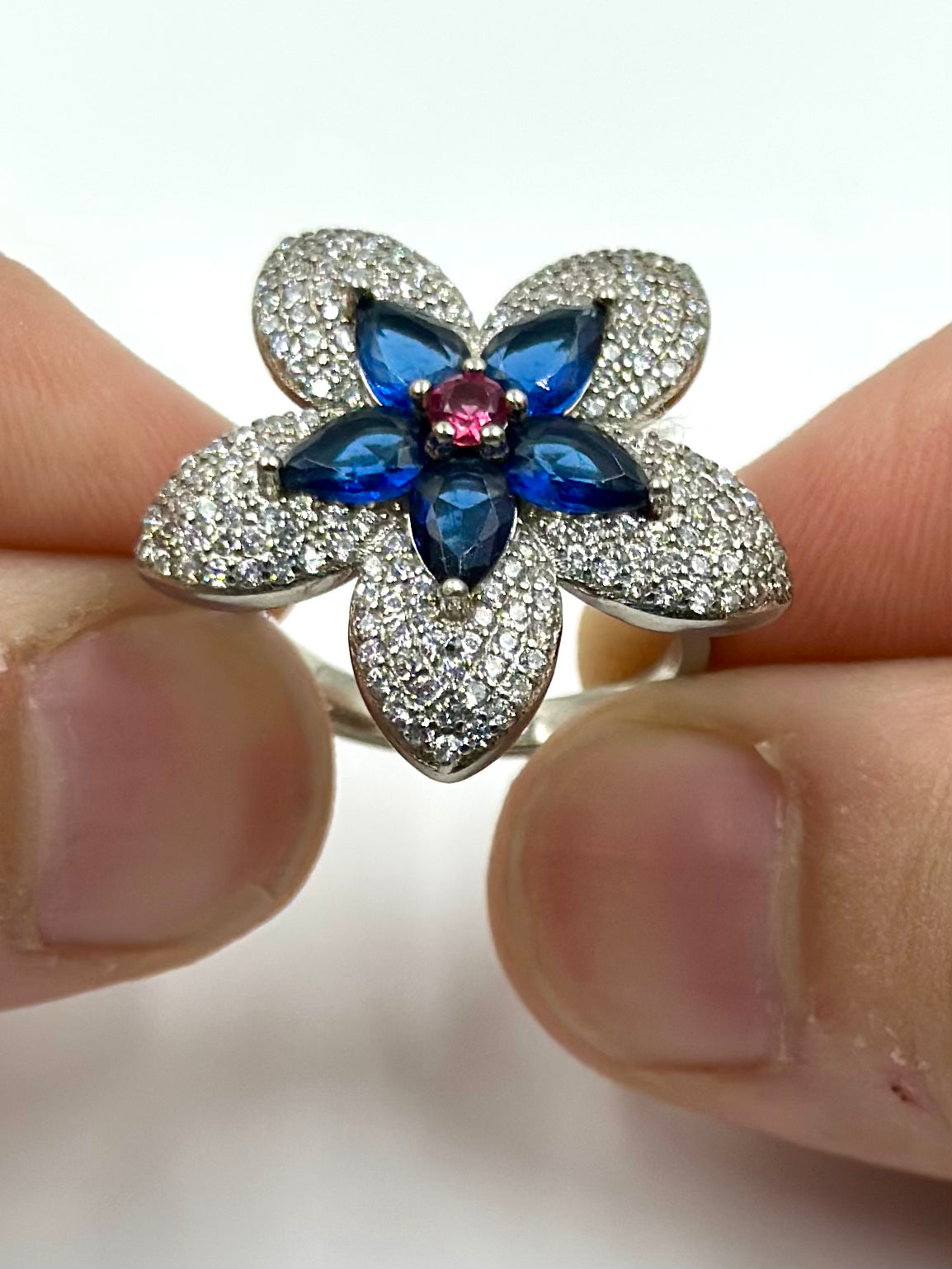Zircon and stone studded, flower shaped sterling silver cocktail ring