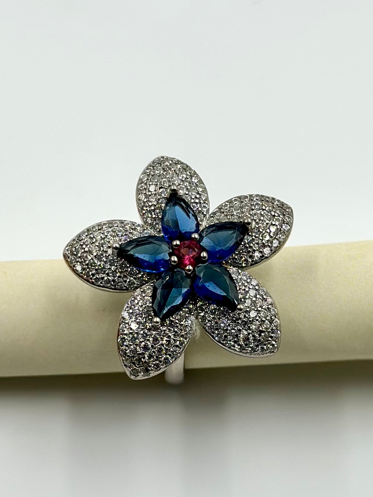 Zircon and stone studded, flower shaped sterling silver cocktail ring