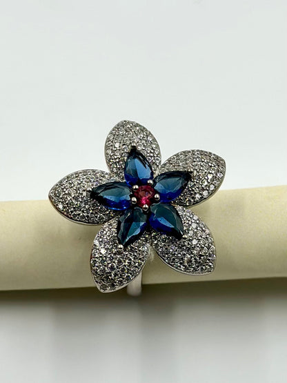 Zircon and stone studded, flower shaped sterling silver cocktail ring