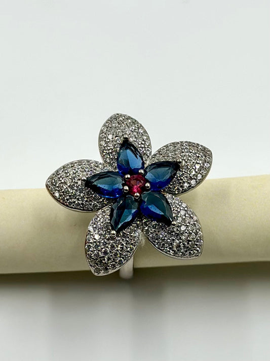 Zircon and stone studded, flower shaped sterling silver cocktail ring