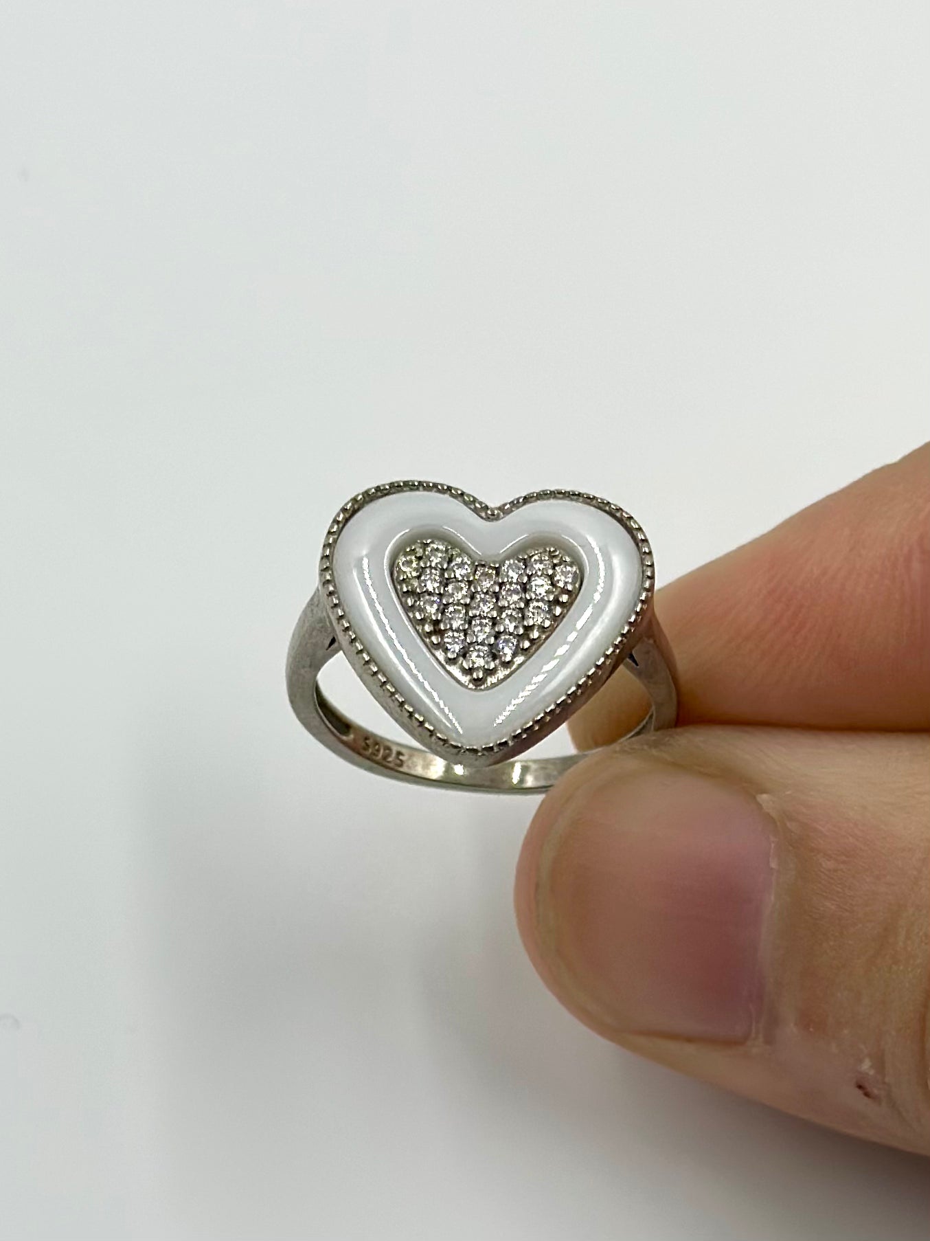 Zircon studded, enamel coated, heart shaped sterling silver cocktail ring