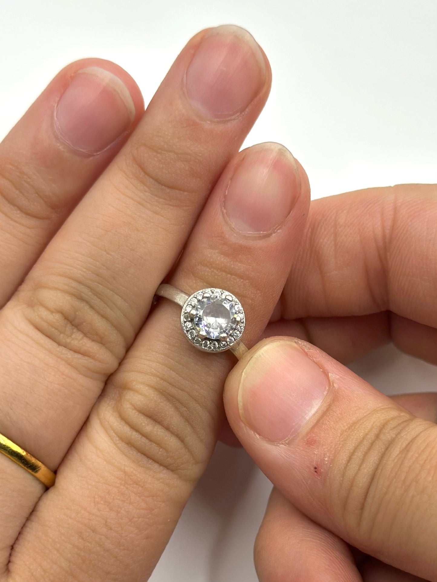 Zircon studded, round shaped sterling silver artisanal ring