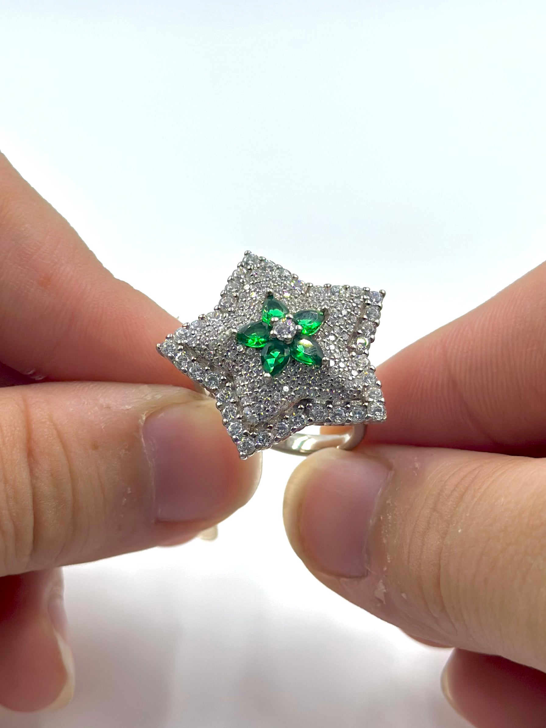 Zircon and stone studded, flower shaped sterling silver cocktail ring