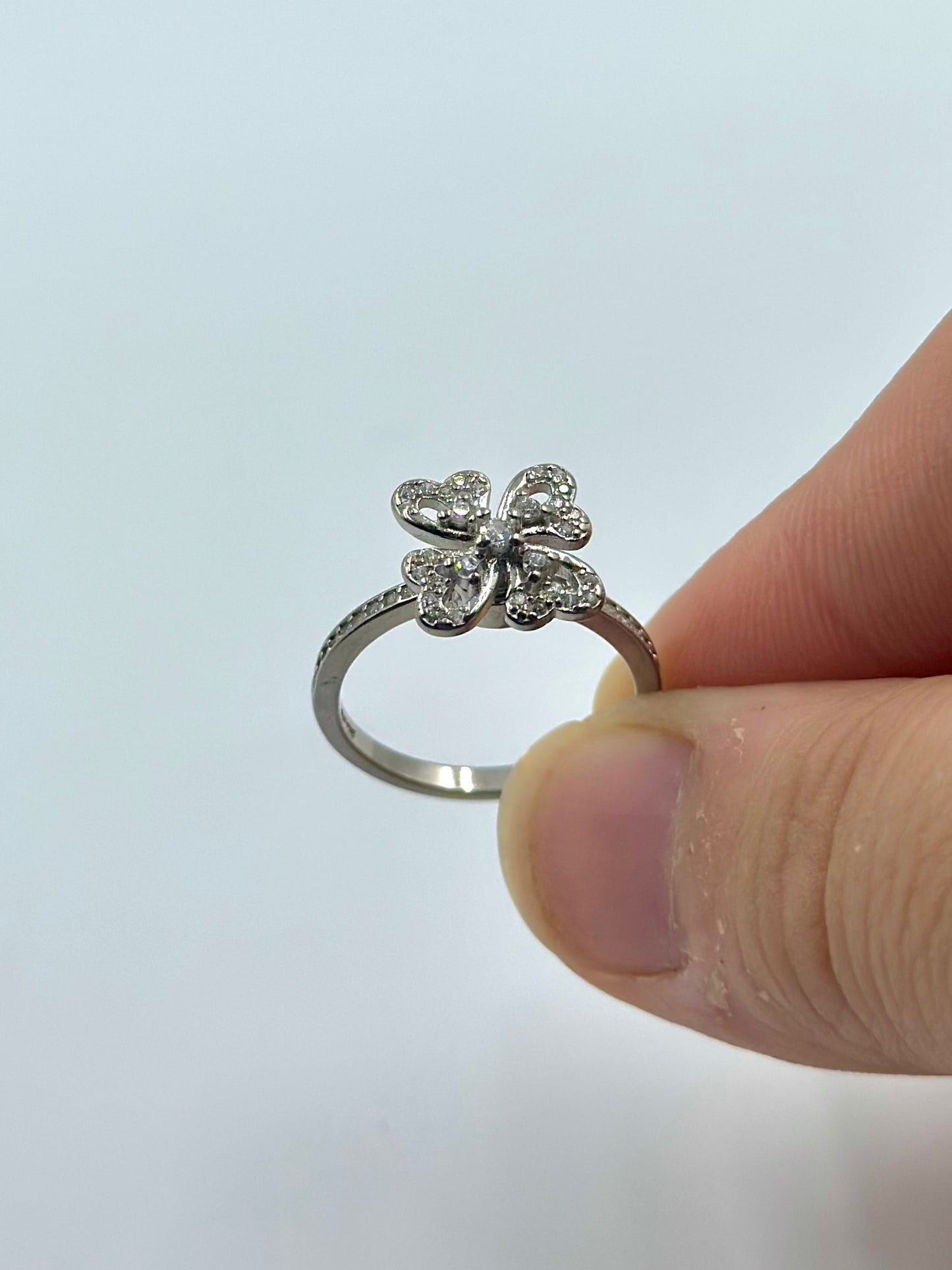 Zircon studded, four leaf shaped with fidget spinner sterling silver artisanal ring