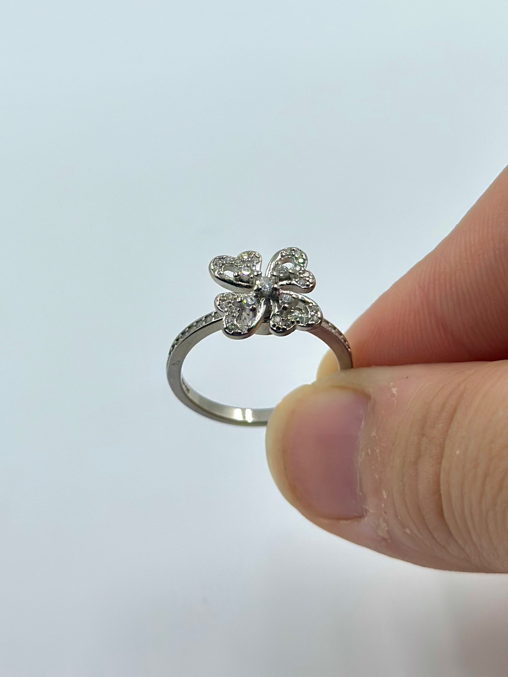 Zircon studded, four leaf shaped with fidget spinner sterling silver artisanal ring