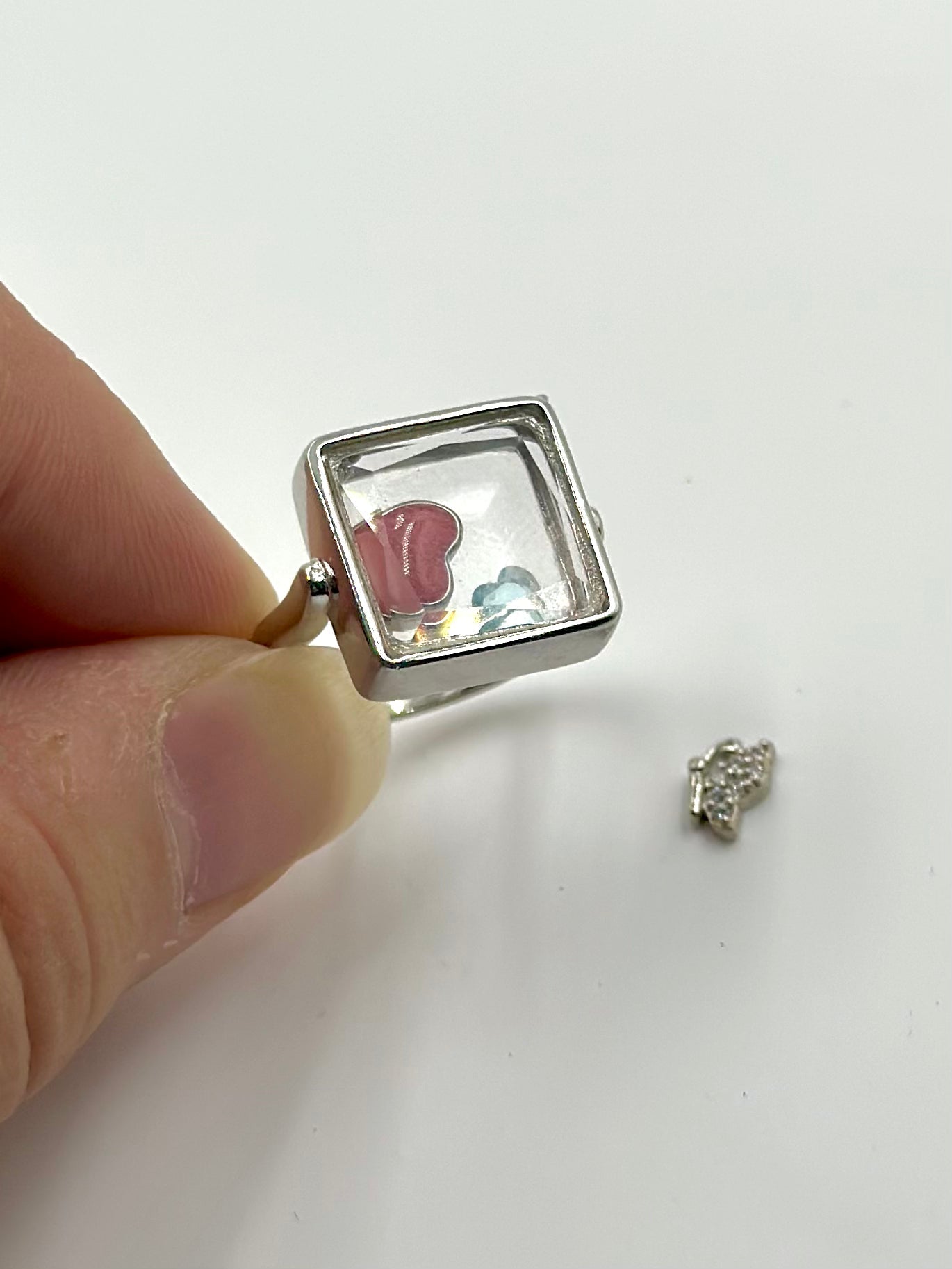 Square shaped with mini gem inside sterling silver cocktail ring